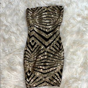 Gold and black sequin dress